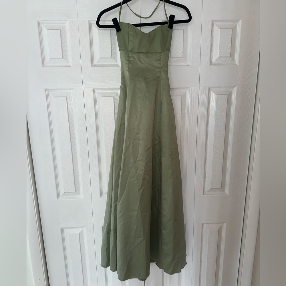 Vintage shiny green corset gown.